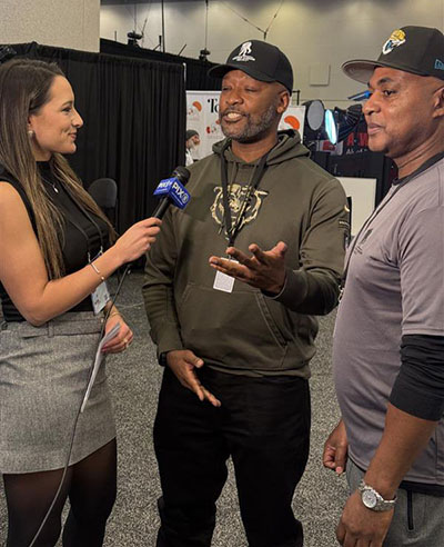 Warriors Nelly Nelson and Joe Lloyd do interviews on Radio Row for Super Bowl LX.